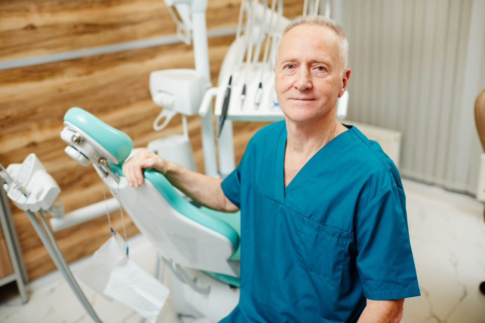 Senior dentist mature dentist