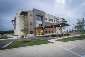 Medical office Dripping Springs side view of Sawyer Ranch Medical Towers showing modern architecture and accessibility