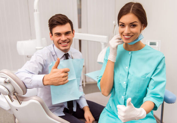 dentist and patient thumbs up
